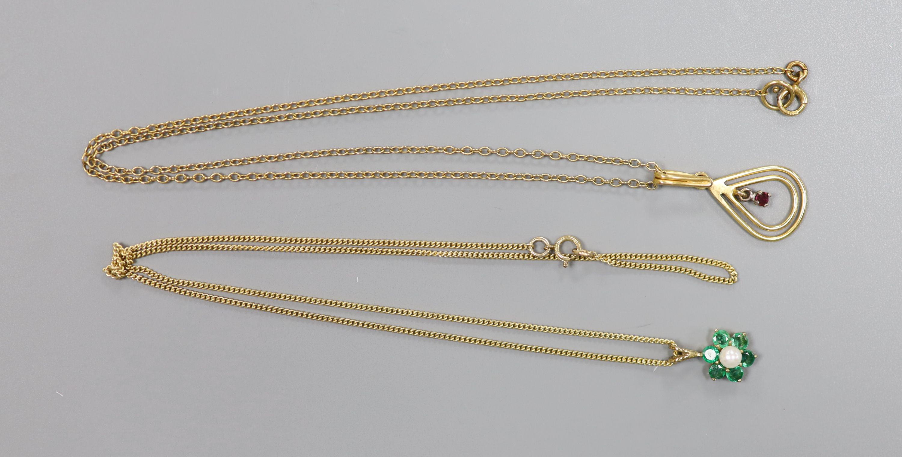 Two modern 9ct gold and gem set pendants on 9ct chains, including emerald & seed pearl cluster, 7mm